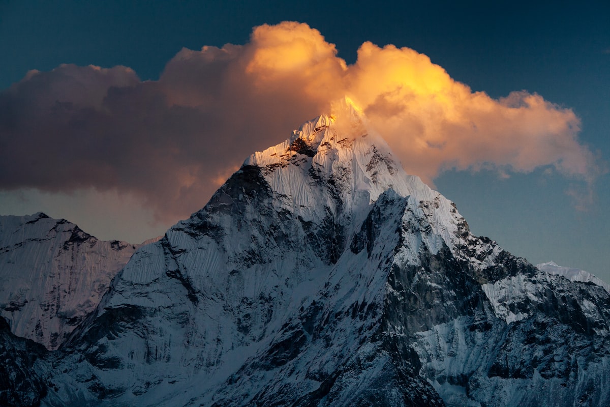 Colorful prayer flags against snow-capped Himalayan peaks